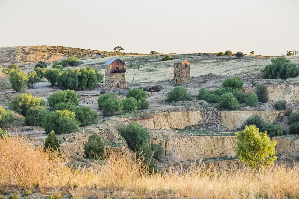A Cornish engine house chimney standing above the old Burra mine workings
